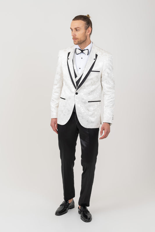 Detail of black mono lapel on a men's white tuxedo suit