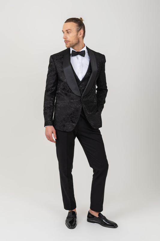 Elegant tuxedo suit with eye-catching lapel pattern, ideal for formal events.