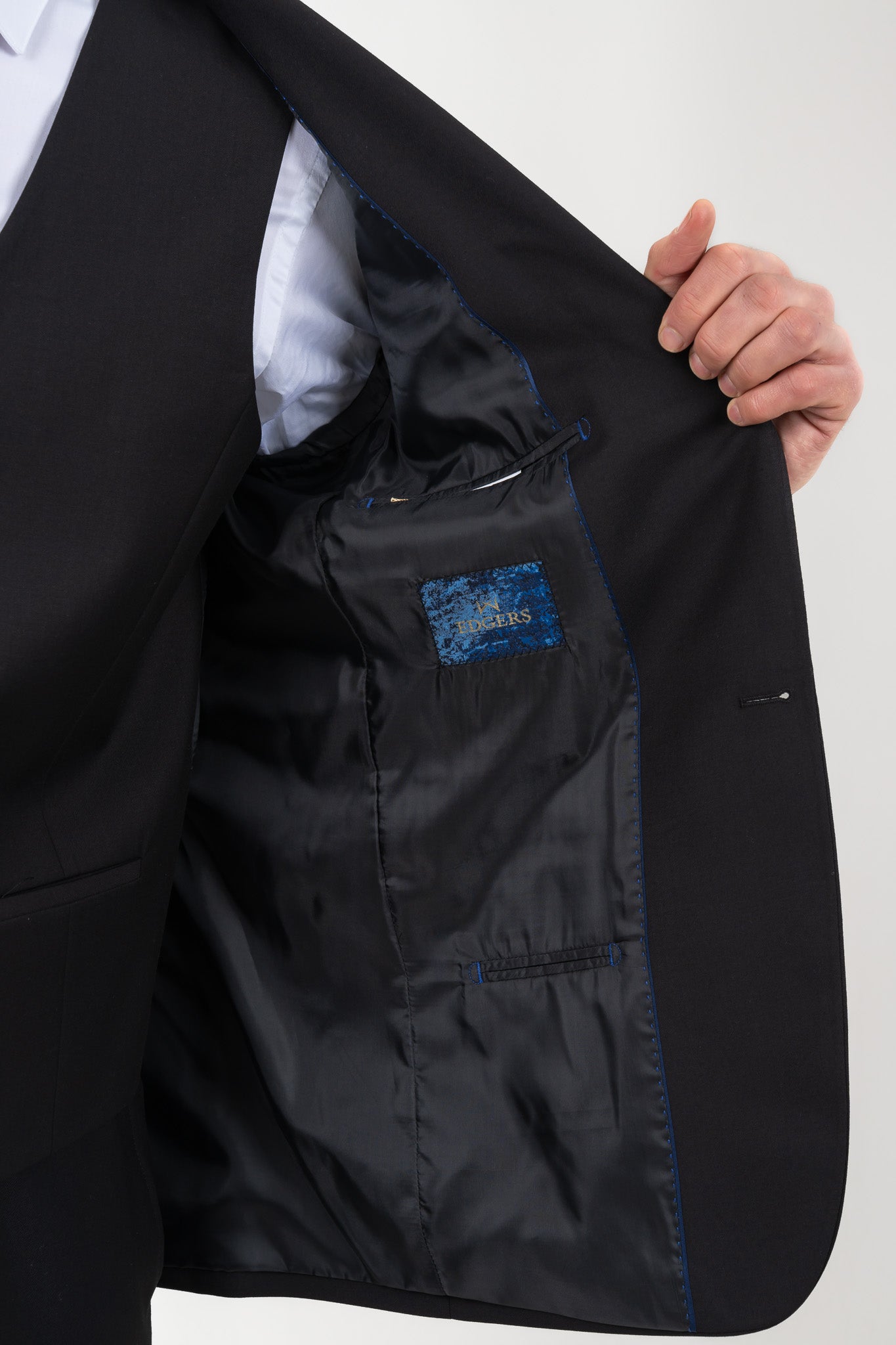 Stylish black jacket paired with matching full suit.