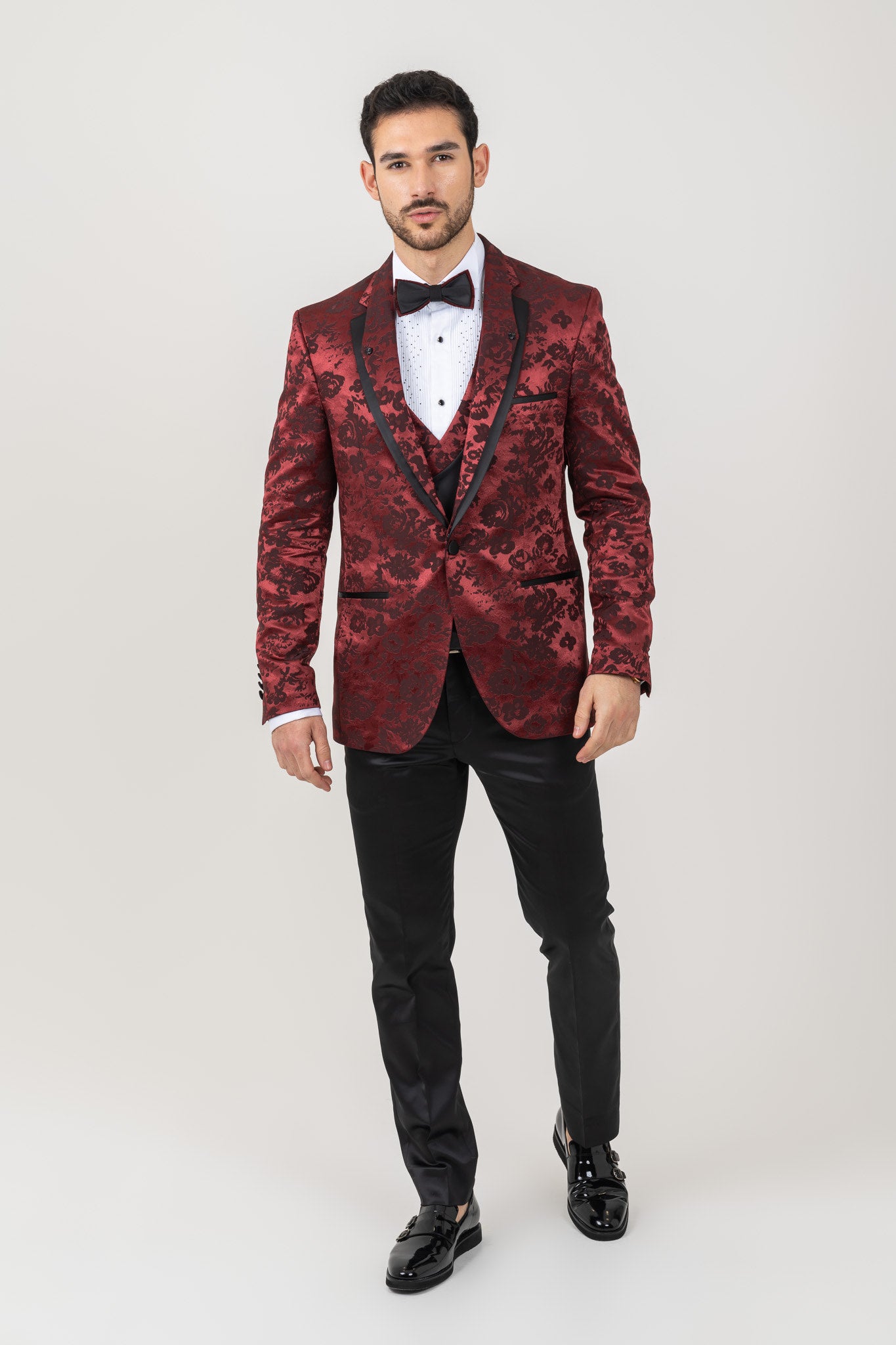Burgundy suit featuring a double lapel design
