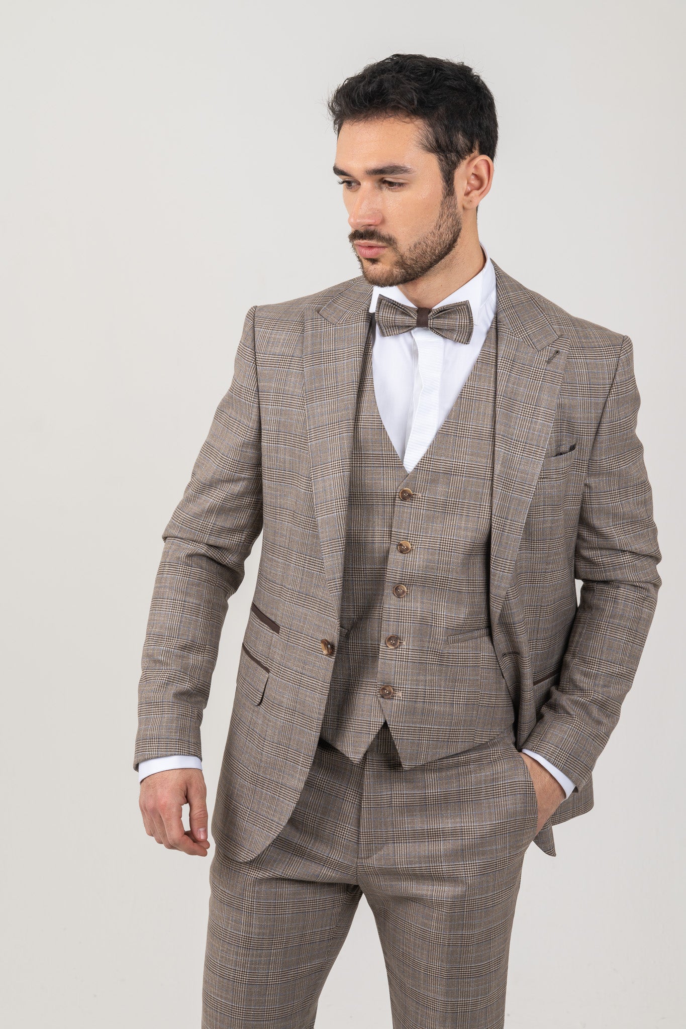 Stylish full brown suit made from tweed checked fabric