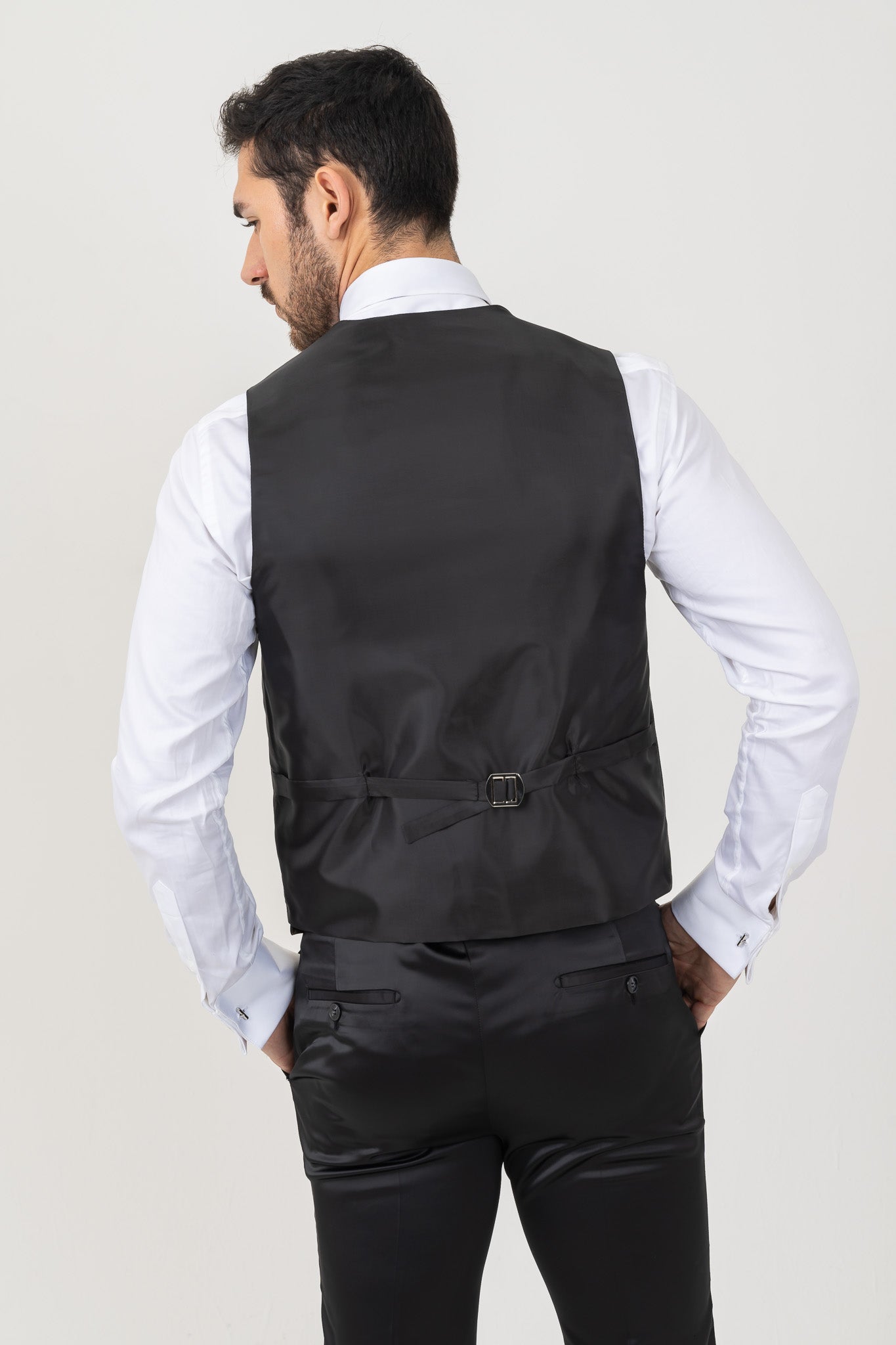Close-up of Shining Fabric on a Black Vest.