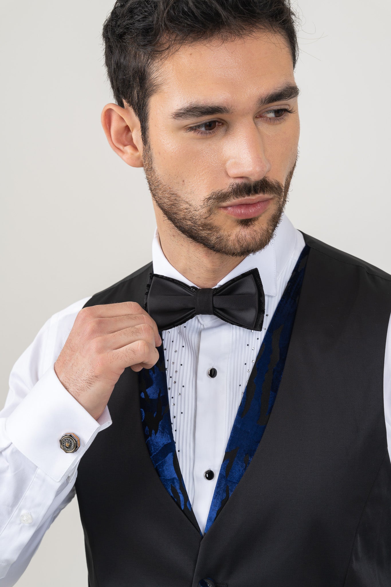 Elegant velvet lining waistcoat paired with a blue paisley velvet suit