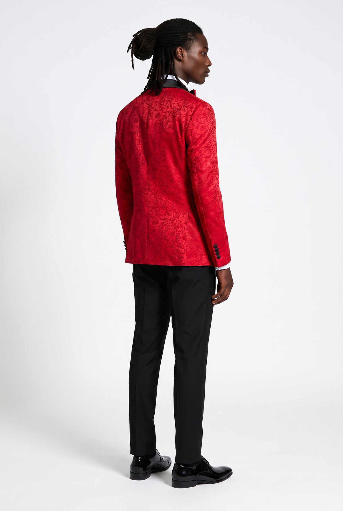 Back view of the red jacquard tuxedo jacket showing the fit through the shoulders
