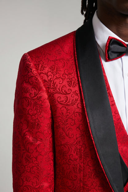 Close-up of the black satin shawl lapel on a red jacquard tuxedo jacket