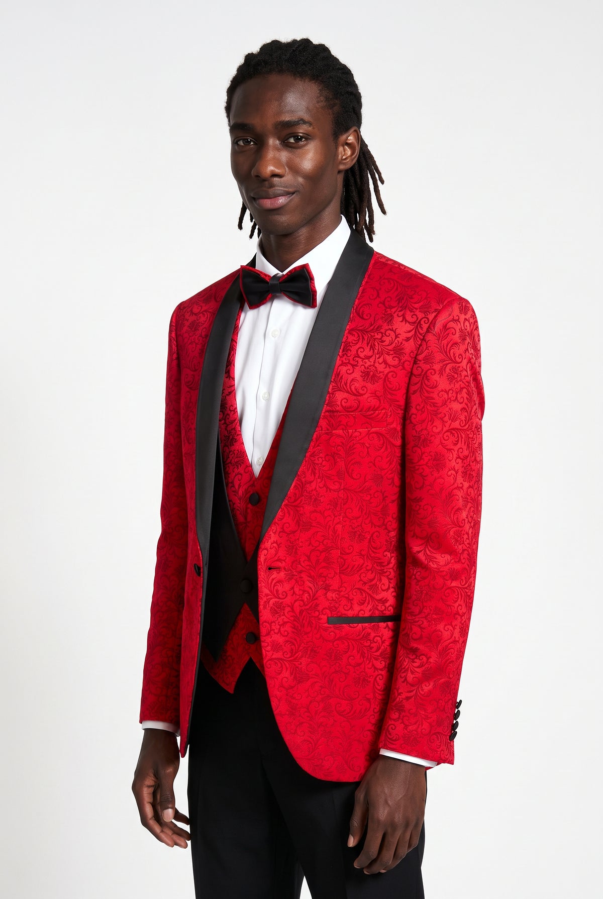 Close-up of the black satin shawl lapel on a red jacquard tuxedo jacket