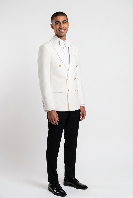 Man wearing a white double breasted tuxedo with a satin shawl lapel and gold buttons